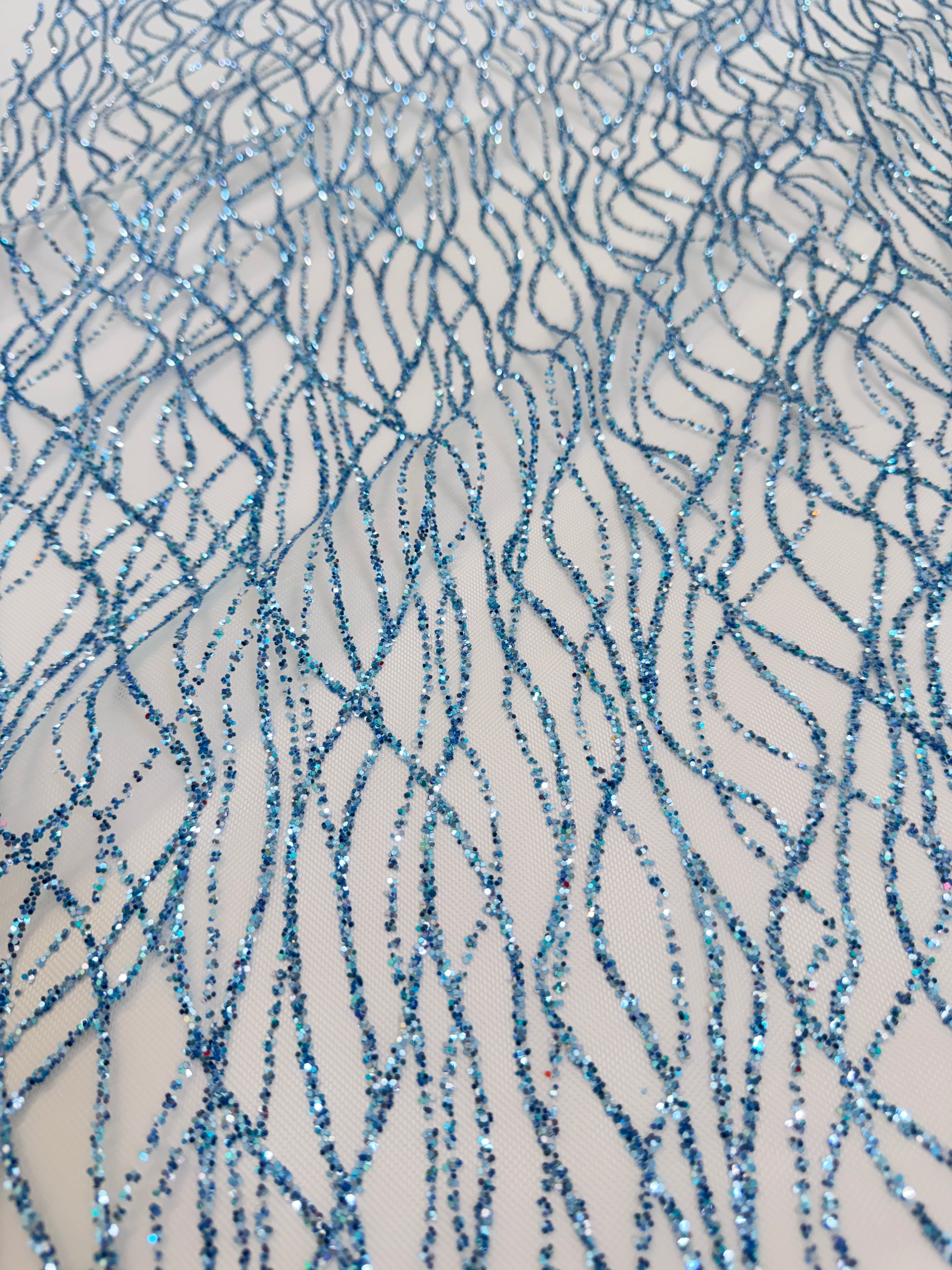 Baby Blue Glitter Lace on Mesh, shop fabrics online, sewing, fabric store, sewing store, cheap fabric store, kiki textiles, textile by the yard