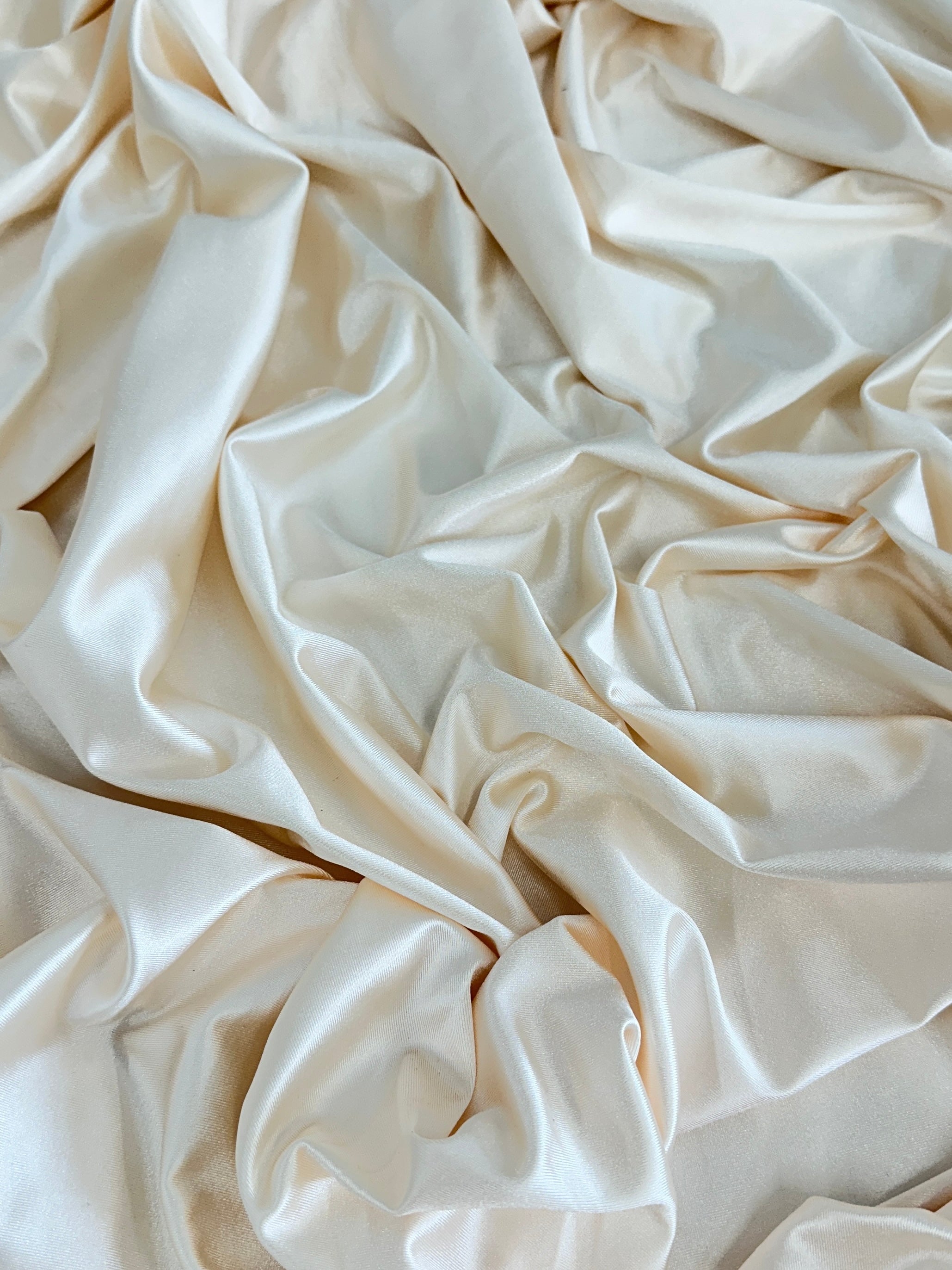 Cream Shiny Nylon Spandex, shop fabrics online, sewing, fabric store, sewing store, cheap fabric store, kiki textiles, textile by the yard