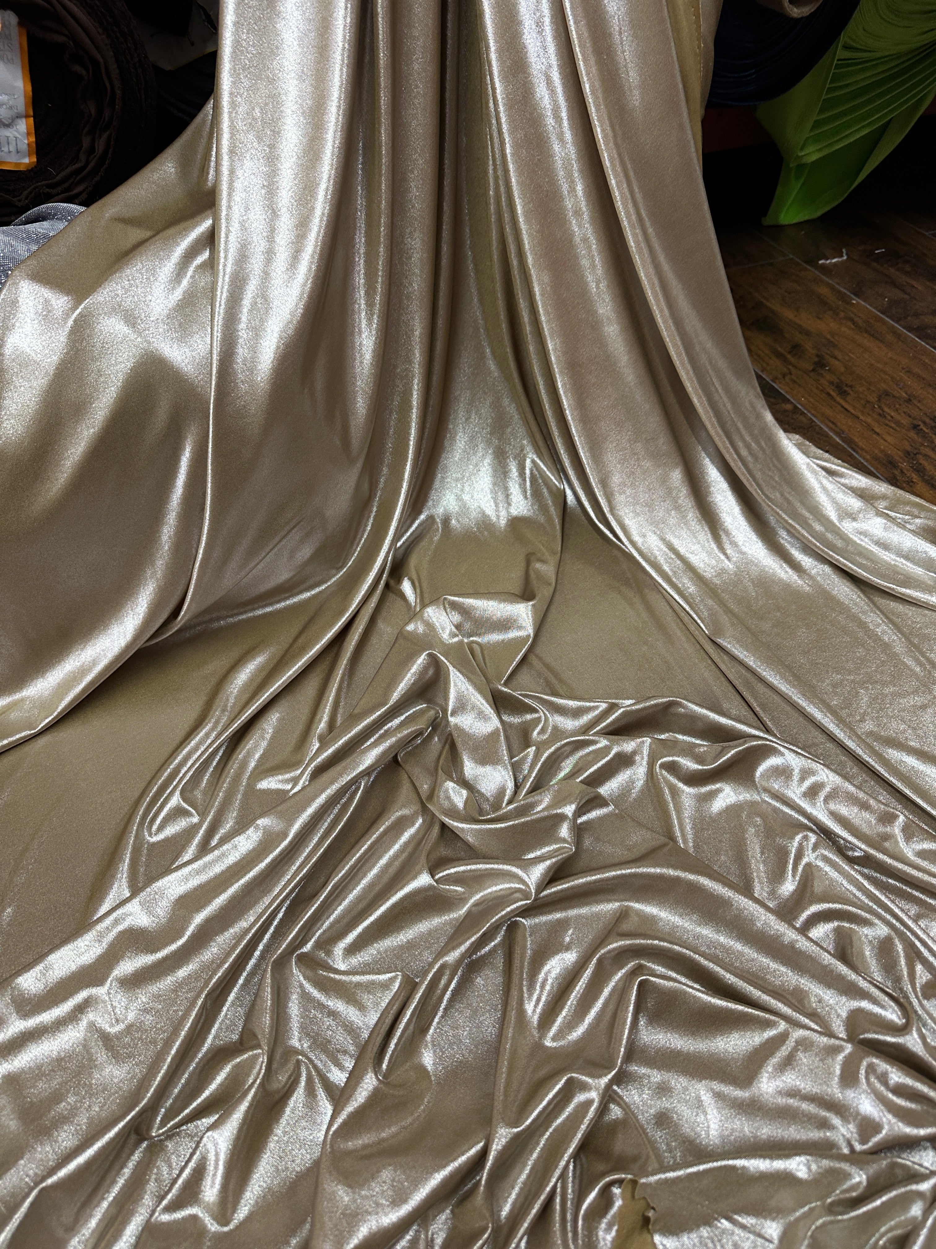 Champagne Slinky Foiled Jersey, dark Champagne Slinky Foiled Jersey, light Champagne Slinky Foiled Jersey, light gold Slinky Foiled Jersey for woman, Slinky Foiled Jersey for bride, Slinky Foiled Jersey on discount, Slinky Foiled Jersey on sale, premium Slinky Foiled Jersey, kiki textile Slinky Foiled Jersey, Slinky Foiled Jersey for party wear, Slinky Foiled Jersey for winter