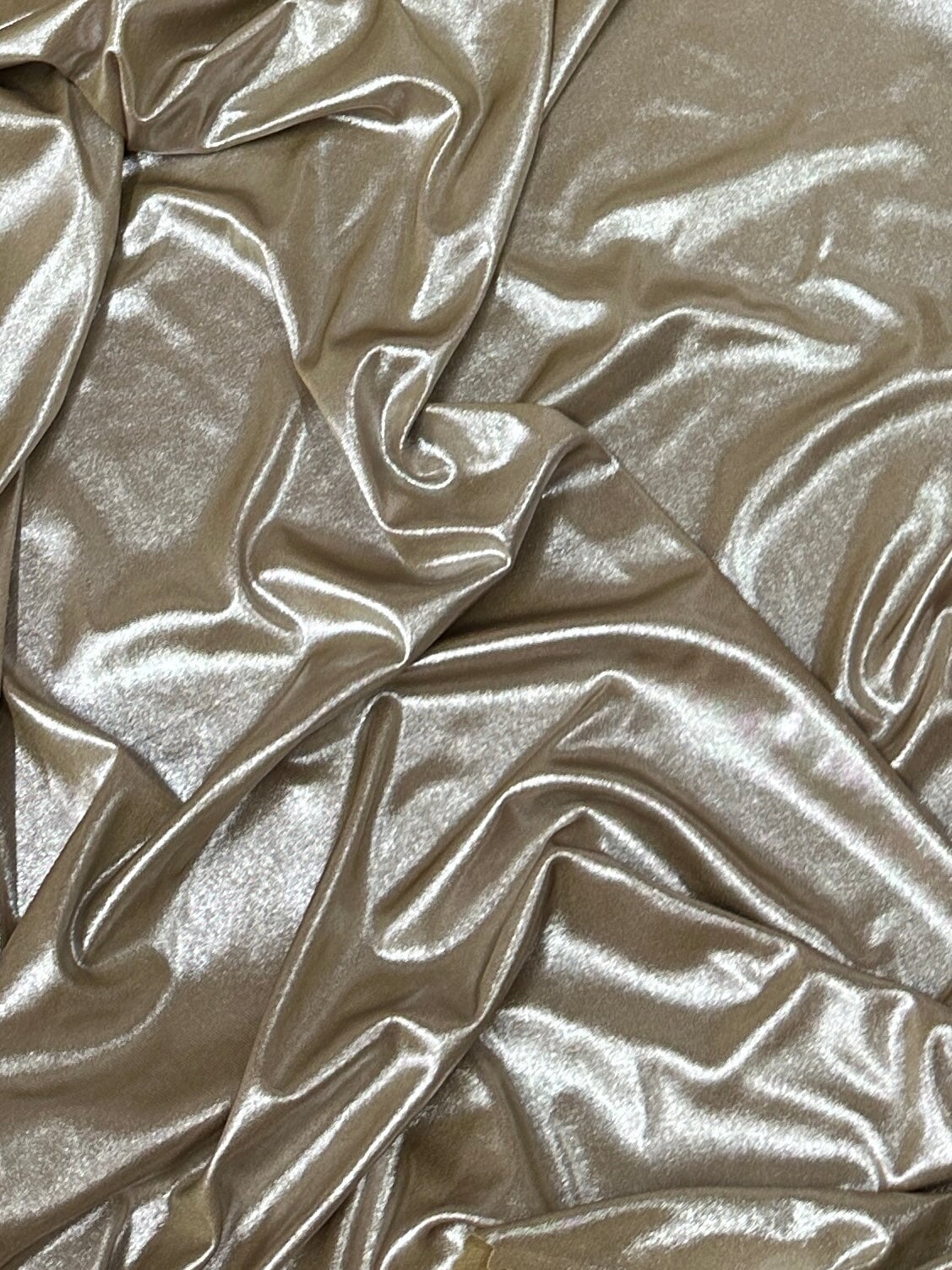 Champagne Slinky Foiled Jersey, dark Champagne Slinky Foiled Jersey, light Champagne Slinky Foiled Jersey, light gold Slinky Foiled Jersey for woman, Slinky Foiled Jersey for bride, Slinky Foiled Jersey on discount, Slinky Foiled Jersey on sale, premium Slinky Foiled Jersey, kiki textile Slinky Foiled Jersey, Slinky Foiled Jersey for party wear, Slinky Foiled Jersey for winter