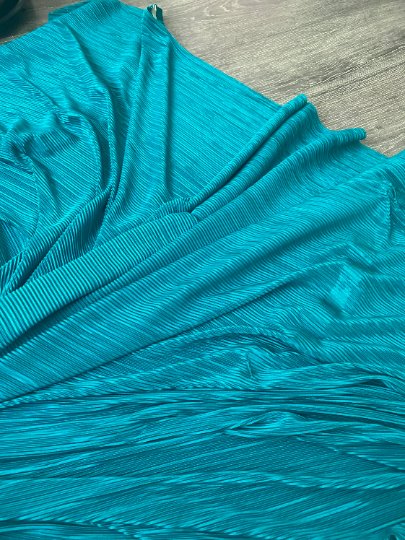 Teal Pleated Stretch Knit, blue Pleated Stretch Knit, light blue Pleated Stretch Knit, party wear Pleated Stretch Knit, shiny Pleated Stretch Knit for woman, Pleated Stretch Knit for bride, Pleated Stretch Knit on discount, Pleated Stretch Knit on sale, buy Pleated Stretch Knit online, Pleated Stretch Knit for gown